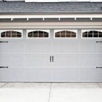 it's a garage door / nothing less and nothing more / than a garage door